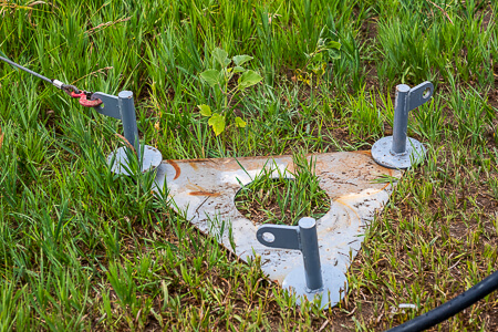 Traverse triangle with stakes in ground