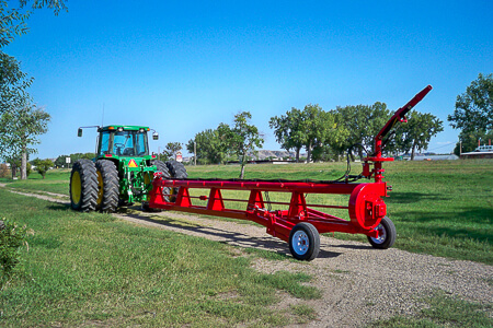 Crisafulli Slurry Pump with spray nozel connected to trailer